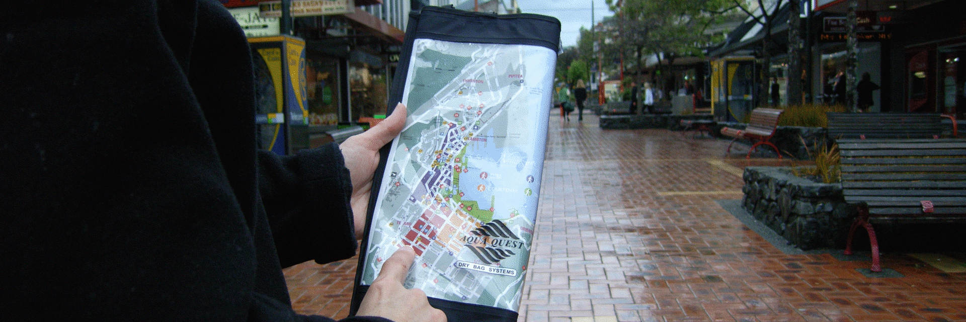 map in document dry bag on rainy day