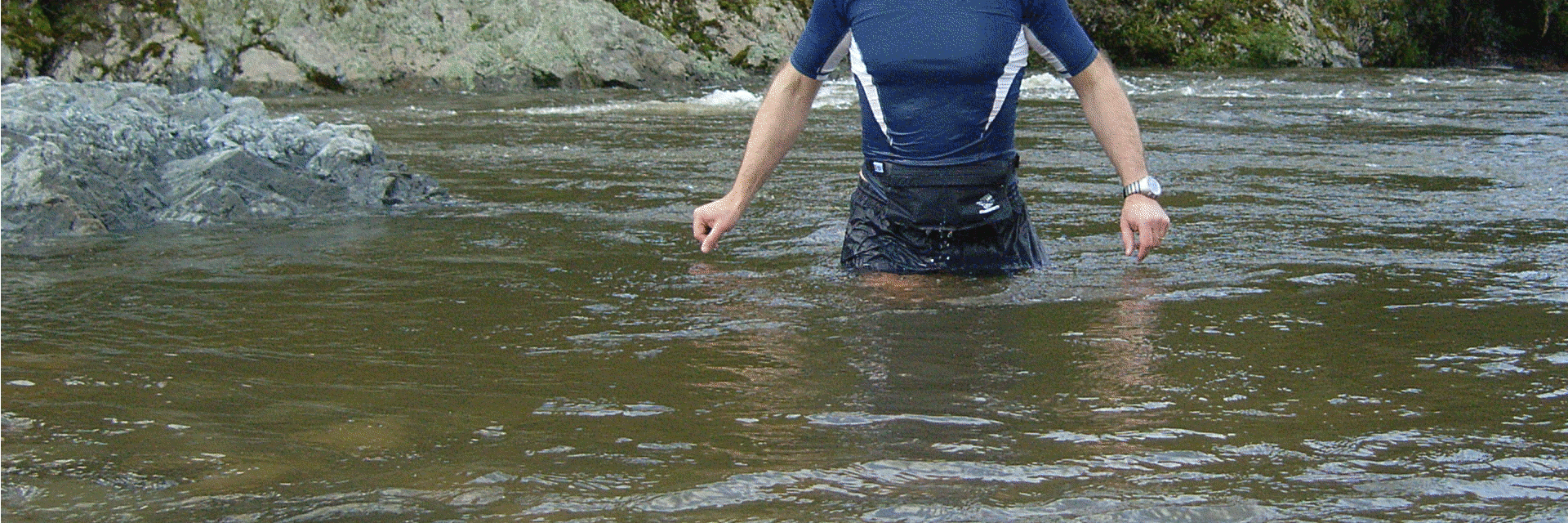 crossing river with waterproof moneybelt 
