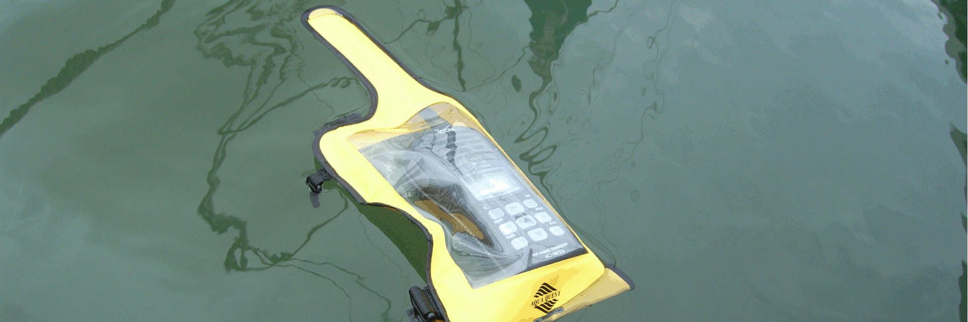 vhf dry bag floating on water